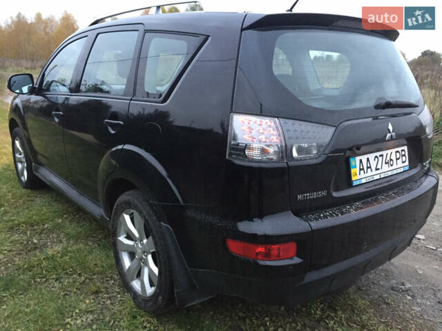 Черный Мицубиси Аутлендер, объемом двигателя 2.36 л и пробегом 315 тыс. км за 9700 $, фото 7 на Automoto.ua
