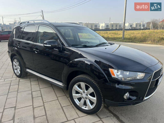 Чорний Міцубісі Аутлендер, об'ємом двигуна 2.36 л та пробігом 244 тис. км за 9850 $, фото 15 на Automoto.ua