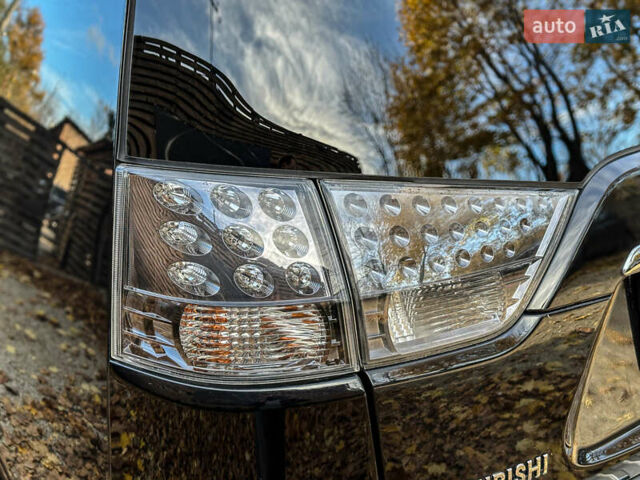 Черный Мицубиси Аутлендер, объемом двигателя 2.2 л и пробегом 226 тыс. км за 11500 $, фото 48 на Automoto.ua