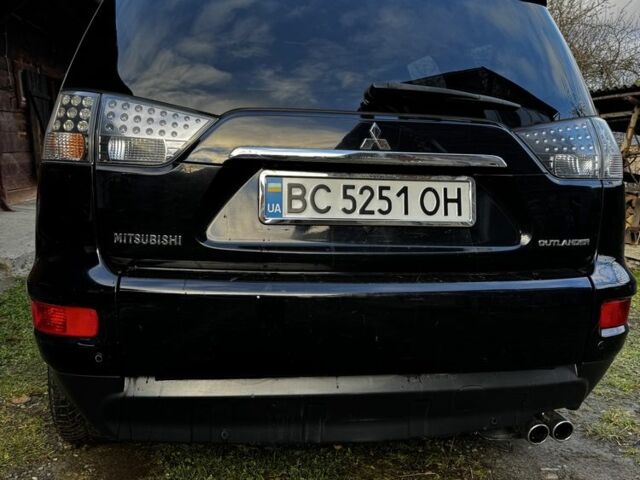 Черный Мицубиси Аутлендер, объемом двигателя 2.2 л и пробегом 249 тыс. км за 11500 $, фото 7 на Automoto.ua