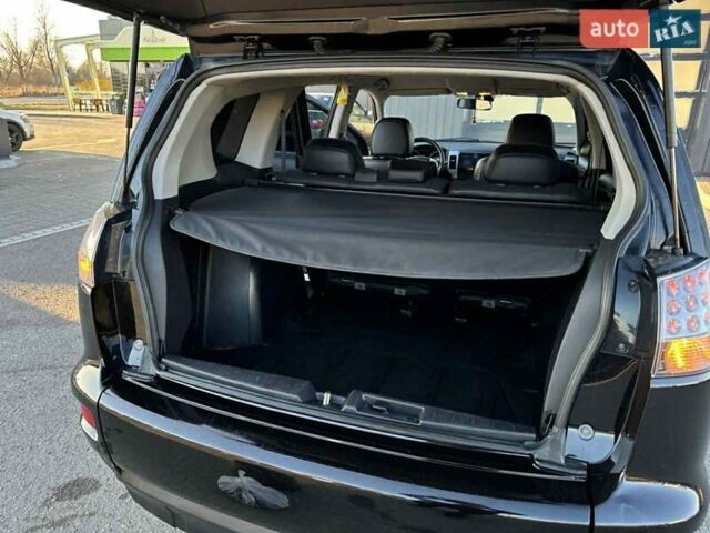 Черный Мицубиси Аутлендер, объемом двигателя 2.2 л и пробегом 264 тыс. км за 10700 $, фото 14 на Automoto.ua