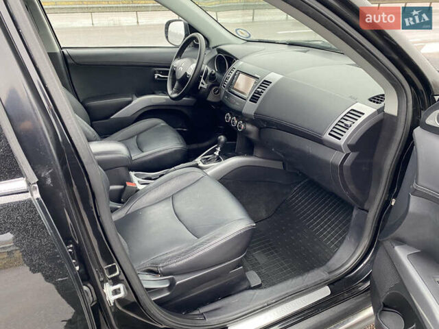 Черный Мицубиси Аутлендер, объемом двигателя 2.2 л и пробегом 227 тыс. км за 10700 $, фото 31 на Automoto.ua