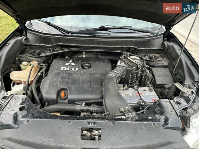 Черный Мицубиси Аутлендер, объемом двигателя 1.97 л и пробегом 224 тыс. км за 9000 $, фото 14 на Automoto.ua