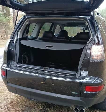 Черный Мицубиси Аутлендер, объемом двигателя 2.2 л и пробегом 267 тыс. км за 9999 $, фото 15 на Automoto.ua