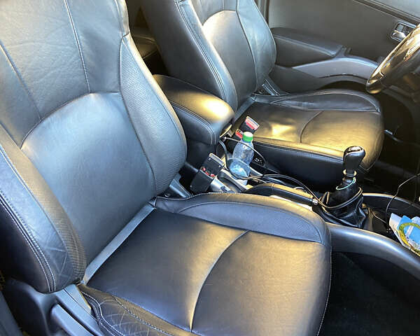 Черный Мицубиси Аутлендер, объемом двигателя 1.97 л и пробегом 292 тыс. км за 10900 $, фото 18 на Automoto.ua