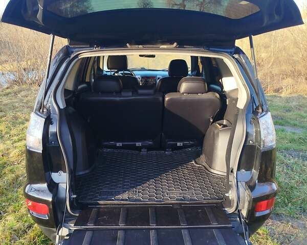 Черный Мицубиси Аутлендер, объемом двигателя 2 л и пробегом 261 тыс. км за 9700 $, фото 15 на Automoto.ua