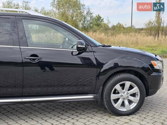 Черный Мицубиси Аутлендер, объемом двигателя 1.97 л и пробегом 270 тыс. км за 11700 $, фото 16 на Automoto.ua