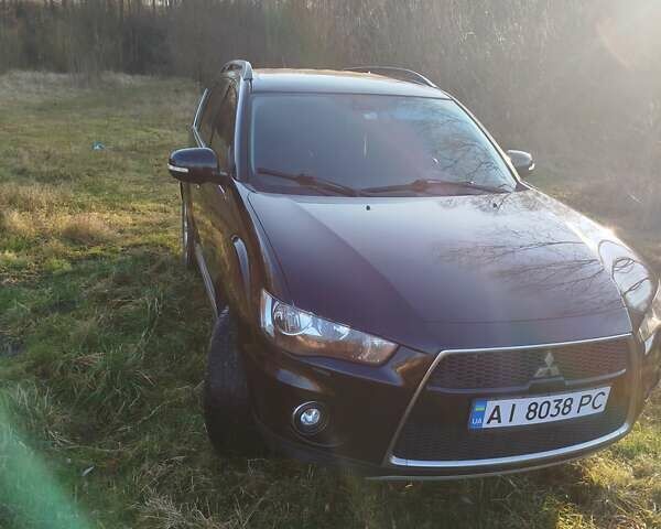 Черный Мицубиси Аутлендер, объемом двигателя 2 л и пробегом 261 тыс. км за 9700 $, фото 4 на Automoto.ua