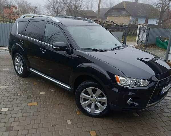 Черный Мицубиси Аутлендер, объемом двигателя 2.2 л и пробегом 225 тыс. км за 11500 $, фото 3 на Automoto.ua