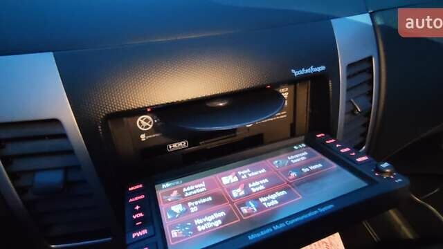 Черный Мицубиси Аутлендер, объемом двигателя 2 л и пробегом 210 тыс. км за 10600 $, фото 42 на Automoto.ua