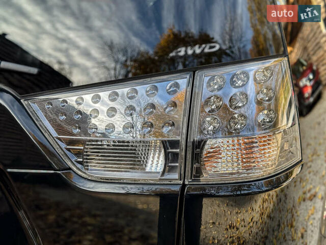 Черный Мицубиси Аутлендер, объемом двигателя 2.2 л и пробегом 226 тыс. км за 11500 $, фото 53 на Automoto.ua