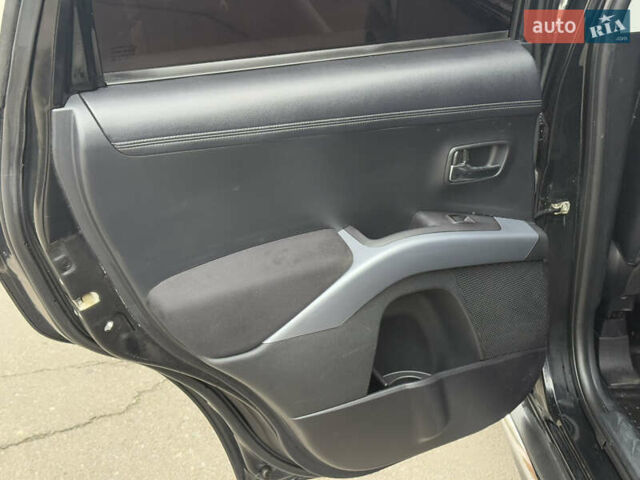 Чорний Міцубісі Аутлендер, об'ємом двигуна 1.97 л та пробігом 276 тис. км за 9200 $, фото 25 на Automoto.ua