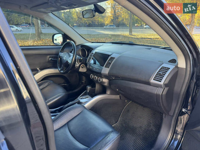 Черный Мицубиси Аутлендер, объемом двигателя 3 л и пробегом 162 тыс. км за 10800 $, фото 14 на Automoto.ua