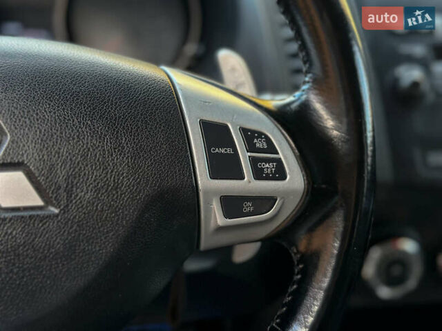 Черный Мицубиси Аутлендер, объемом двигателя 2.2 л и пробегом 226 тыс. км за 11500 $, фото 70 на Automoto.ua