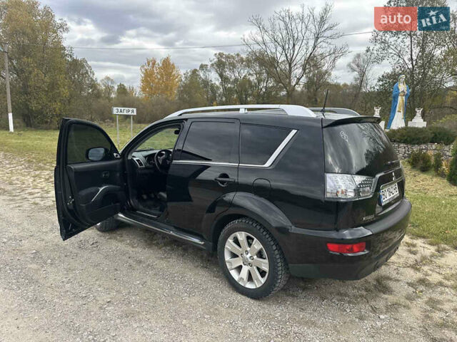 Черный Мицубиси Аутлендер, объемом двигателя 1.97 л и пробегом 224 тыс. км за 9000 $, фото 3 на Automoto.ua