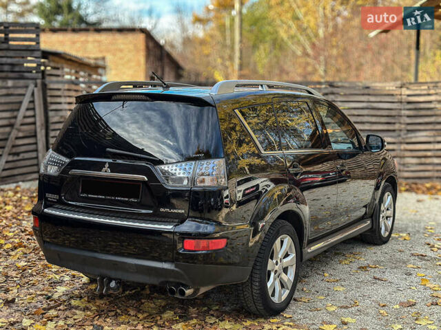 Черный Мицубиси Аутлендер, объемом двигателя 2.2 л и пробегом 226 тыс. км за 11500 $, фото 22 на Automoto.ua