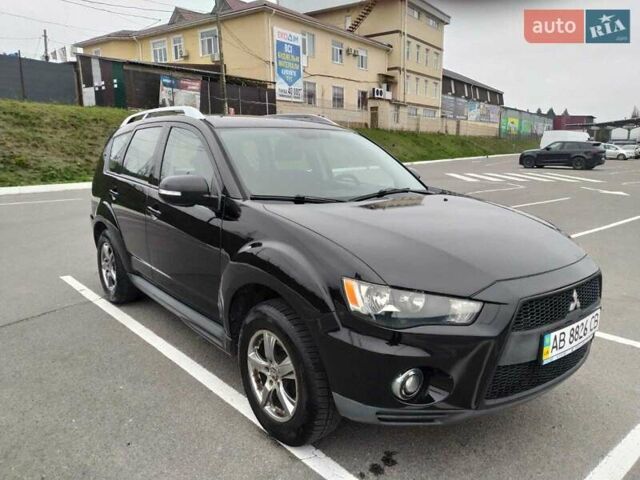 Чорний Міцубісі Аутлендер, об'ємом двигуна 2 л та пробігом 226 тис. км за 10750 $, фото 1 на Automoto.ua
