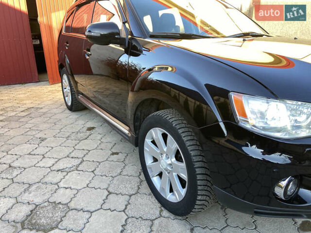 Черный Мицубиси Аутлендер, объемом двигателя 1.97 л и пробегом 292 тыс. км за 10900 $, фото 10 на Automoto.ua