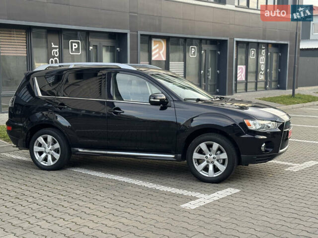 Черный Мицубиси Аутлендер, объемом двигателя 2.2 л и пробегом 225 тыс. км за 10950 $, фото 13 на Automoto.ua