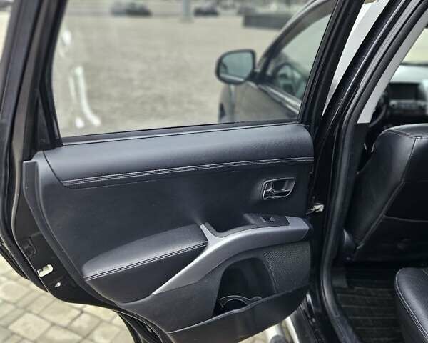 Чорний Міцубісі Аутлендер, об'ємом двигуна 2.4 л та пробігом 70 тис. км за 13000 $, фото 14 на Automoto.ua