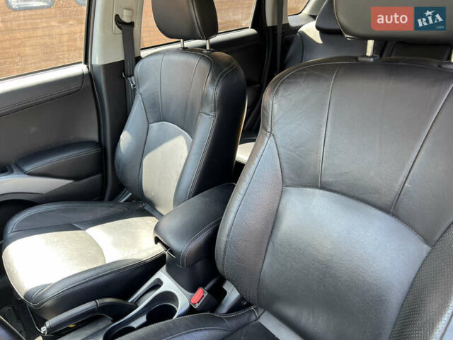 Чорний Міцубісі Аутлендер, об'ємом двигуна 2.2 л та пробігом 214 тис. км за 10600 $, фото 19 на Automoto.ua