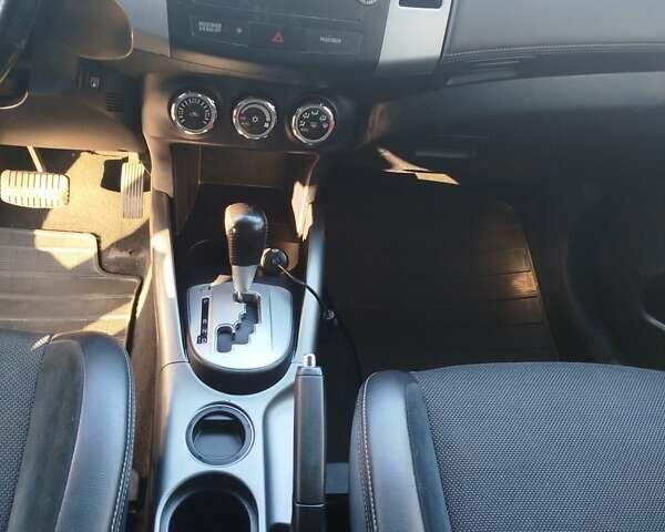 Черный Мицубиси Аутлендер, объемом двигателя 2 л и пробегом 261 тыс. км за 9700 $, фото 21 на Automoto.ua