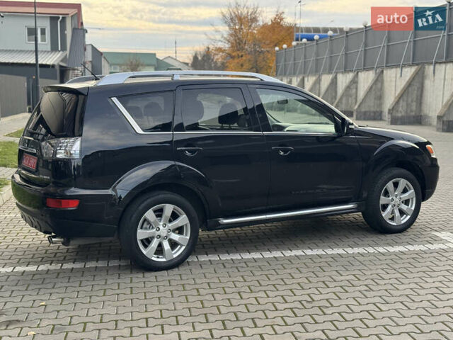 Черный Мицубиси Аутлендер, объемом двигателя 2.2 л и пробегом 225 тыс. км за 10950 $, фото 15 на Automoto.ua