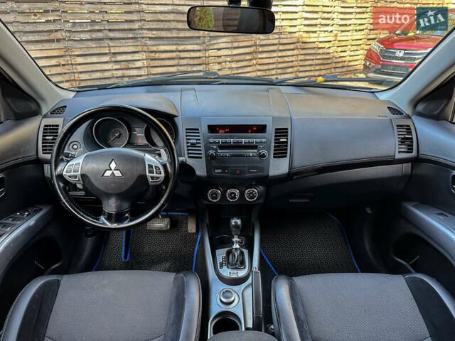 Черный Мицубиси Аутлендер, объемом двигателя 2.2 л и пробегом 226 тыс. км за 11500 $, фото 83 на Automoto.ua