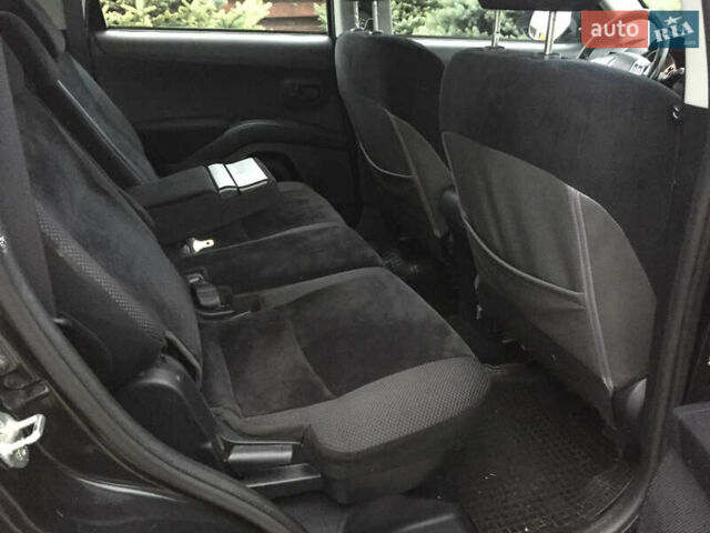 Черный Мицубиси Аутлендер, объемом двигателя 2.36 л и пробегом 315 тыс. км за 9700 $, фото 15 на Automoto.ua