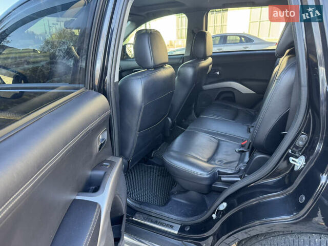 Черный Мицубиси Аутлендер, объемом двигателя 3 л и пробегом 162 тыс. км за 10800 $, фото 13 на Automoto.ua