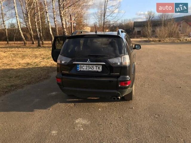 Чорний Міцубісі Аутлендер, об'ємом двигуна 2.3 л та пробігом 254 тис. км за 12000 $, фото 3 на Automoto.ua