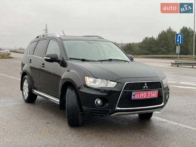 Черный Мицубиси Аутлендер, объемом двигателя 2.2 л и пробегом 227 тыс. км за 10700 $, фото 15 на Automoto.ua