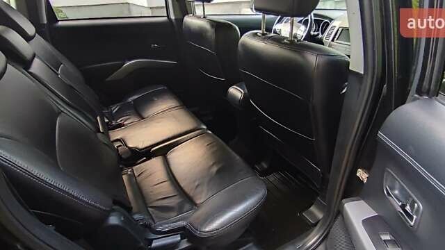 Черный Мицубиси Аутлендер, объемом двигателя 2 л и пробегом 210 тыс. км за 10600 $, фото 14 на Automoto.ua