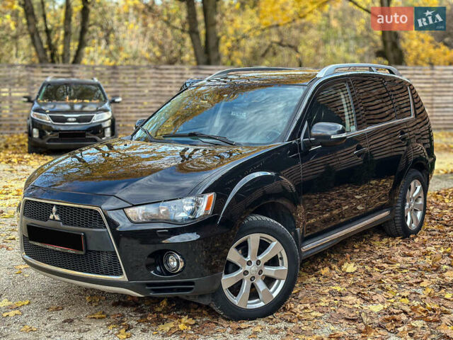 Черный Мицубиси Аутлендер, объемом двигателя 2.2 л и пробегом 226 тыс. км за 11500 $, фото 13 на Automoto.ua