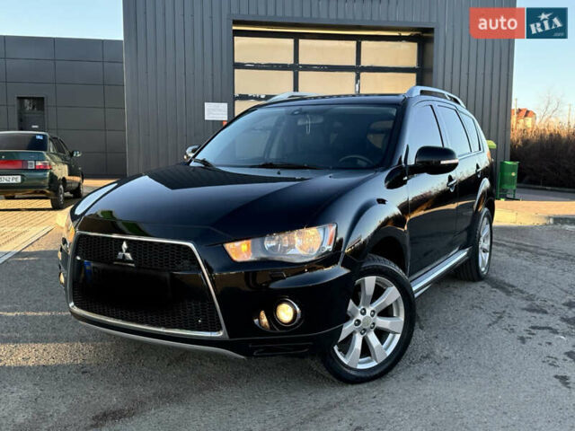 Черный Мицубиси Аутлендер, объемом двигателя 2.2 л и пробегом 263 тыс. км за 11300 $, фото 4 на Automoto.ua