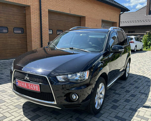 Чорний Міцубісі Аутлендер, об'ємом двигуна 2.2 л та пробігом 214 тис. км за 10600 $, фото 1 на Automoto.ua