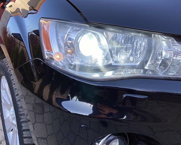 Черный Мицубиси Аутлендер, объемом двигателя 1.97 л и пробегом 292 тыс. км за 10900 $, фото 9 на Automoto.ua