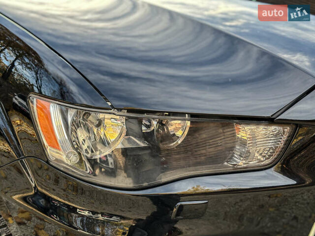 Черный Мицубиси Аутлендер, объемом двигателя 2.2 л и пробегом 226 тыс. км за 11500 $, фото 42 на Automoto.ua