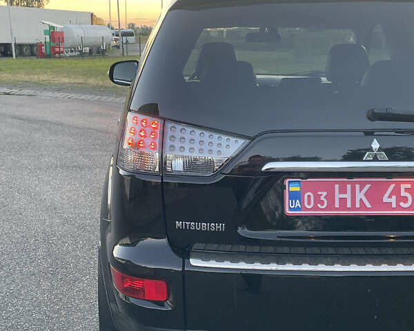 Черный Мицубиси Аутлендер, объемом двигателя 0 л и пробегом 257 тыс. км за 10399 $, фото 12 на Automoto.ua