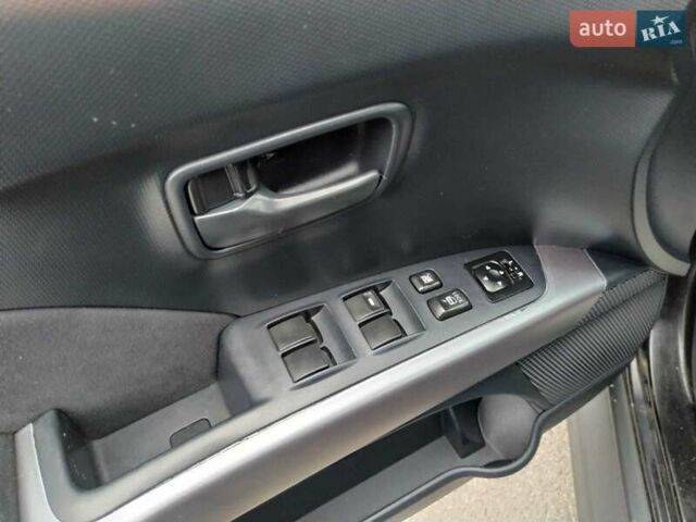 Чорний Міцубісі Аутлендер, об'ємом двигуна 2 л та пробігом 226 тис. км за 10750 $, фото 6 на Automoto.ua