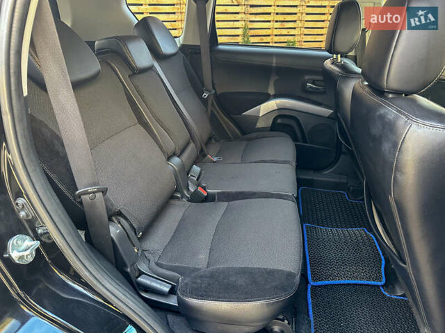 Черный Мицубиси Аутлендер, объемом двигателя 2.2 л и пробегом 226 тыс. км за 11500 $, фото 94 на Automoto.ua