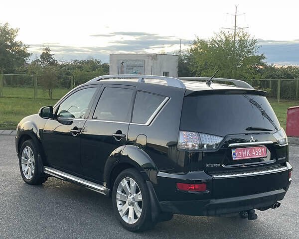 Черный Мицубиси Аутлендер, объемом двигателя 0 л и пробегом 257 тыс. км за 10399 $, фото 3 на Automoto.ua