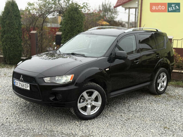 Черный Мицубиси Аутлендер, объемом двигателя 2.4 л и пробегом 184 тыс. км за 10800 $, фото 7 на Automoto.ua