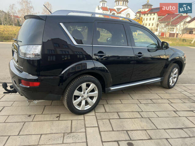 Черный Мицубиси Аутлендер, объемом двигателя 2.36 л и пробегом 244 тыс. км за 9850 $, фото 8 на Automoto.ua