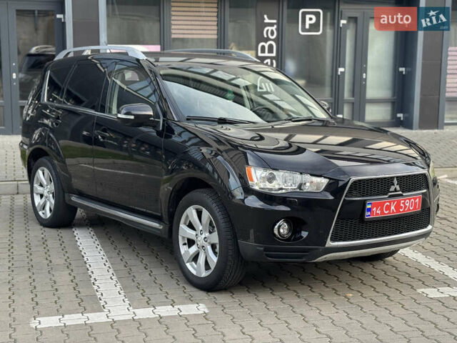 Черный Мицубиси Аутлендер, объемом двигателя 2.2 л и пробегом 225 тыс. км за 10950 $, фото 7 на Automoto.ua