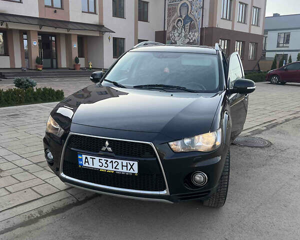 Чорний Міцубісі Аутлендер, об'ємом двигуна 2.36 л та пробігом 244 тис. км за 9850 $, фото 19 на Automoto.ua