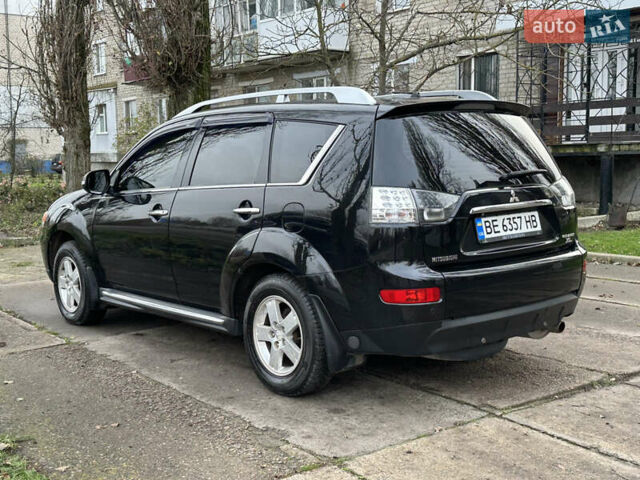 Чорний Міцубісі Аутлендер, об'ємом двигуна 2.36 л та пробігом 197 тис. км за 11300 $, фото 4 на Automoto.ua