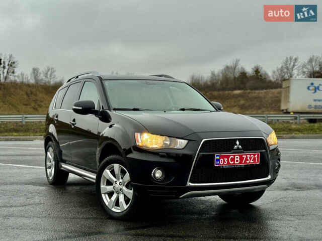 Чорний Міцубісі Аутлендер, об'ємом двигуна 2 л та пробігом 228 тис. км за 10550 $, фото 44 на Automoto.ua