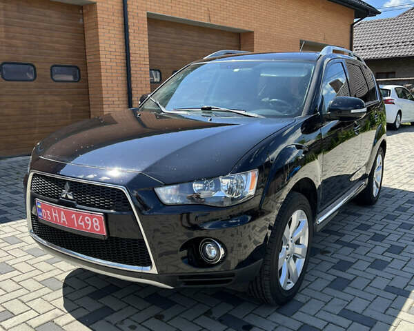 Чорний Міцубісі Аутлендер, об'ємом двигуна 2.2 л та пробігом 214 тис. км за 10600 $, фото 12 на Automoto.ua