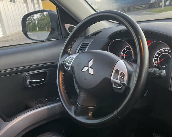 Черный Мицубиси Аутлендер, объемом двигателя 0 л и пробегом 257 тыс. км за 10399 $, фото 37 на Automoto.ua